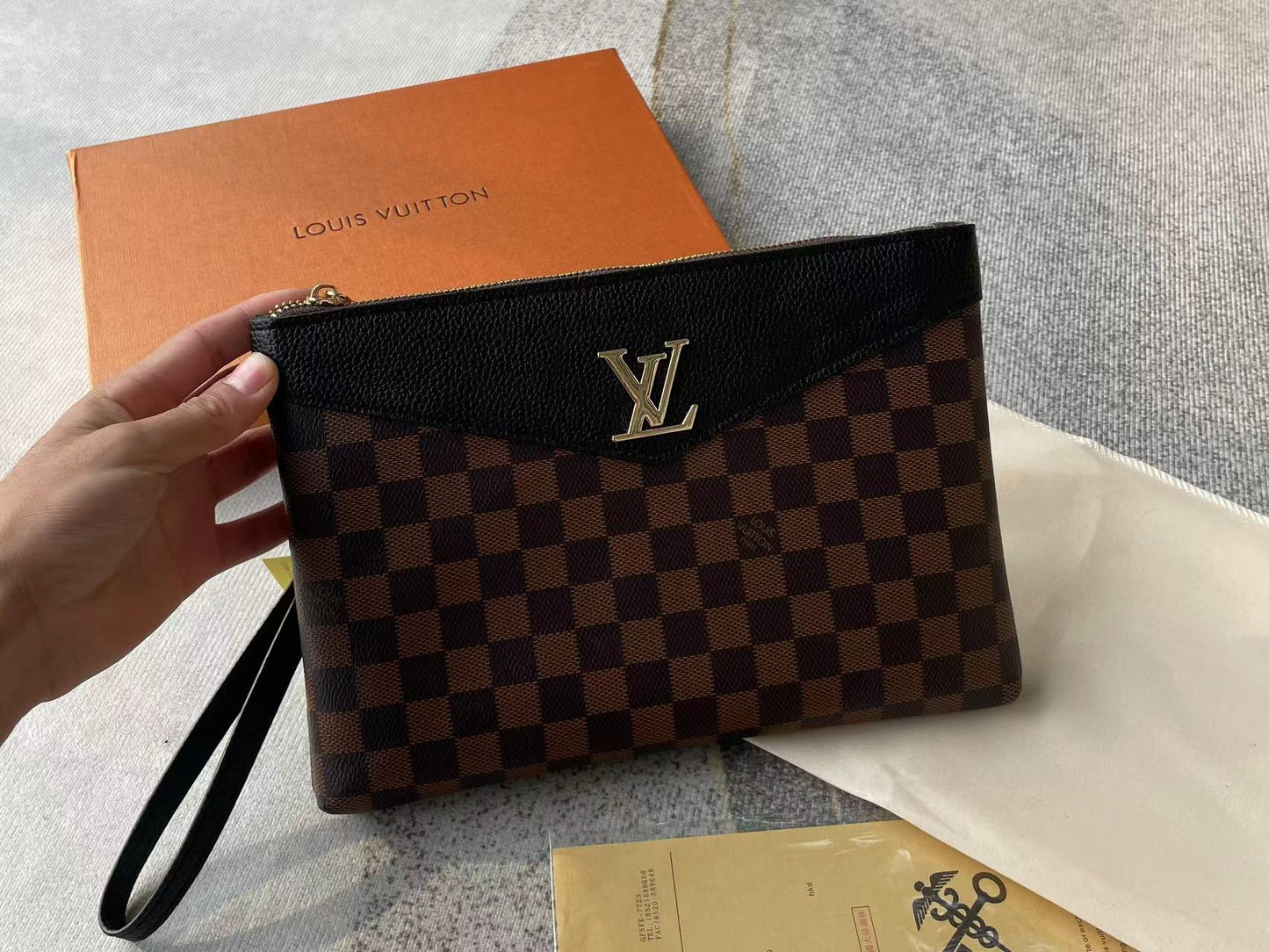 Louis vuitton handbag (wristlet bag)