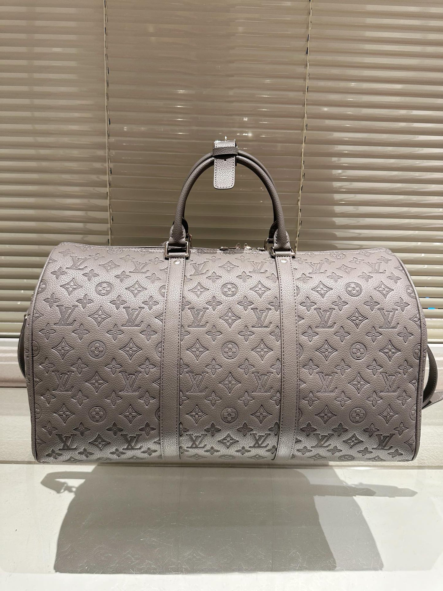 Louis vuitton handbags ( duffle, weekender ,traveling)