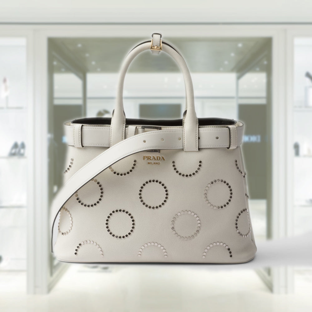 Prada Buckle medium leather bag with appliqués
