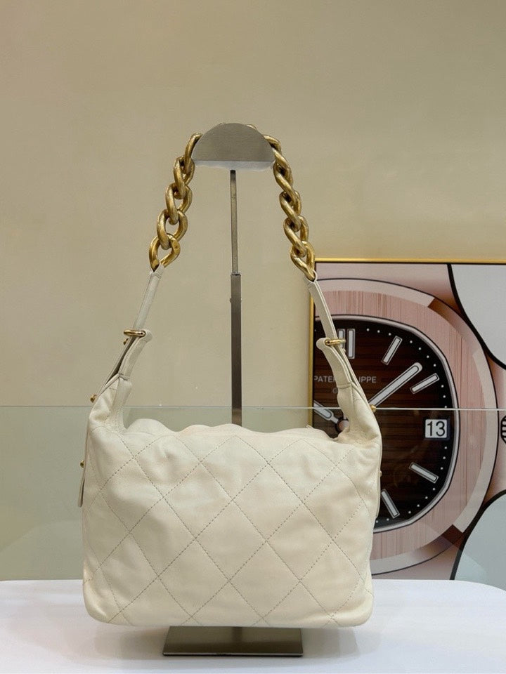 Chanel Beige Quailted Shoulder Bag - Iconic Style with Classic Chain Straps